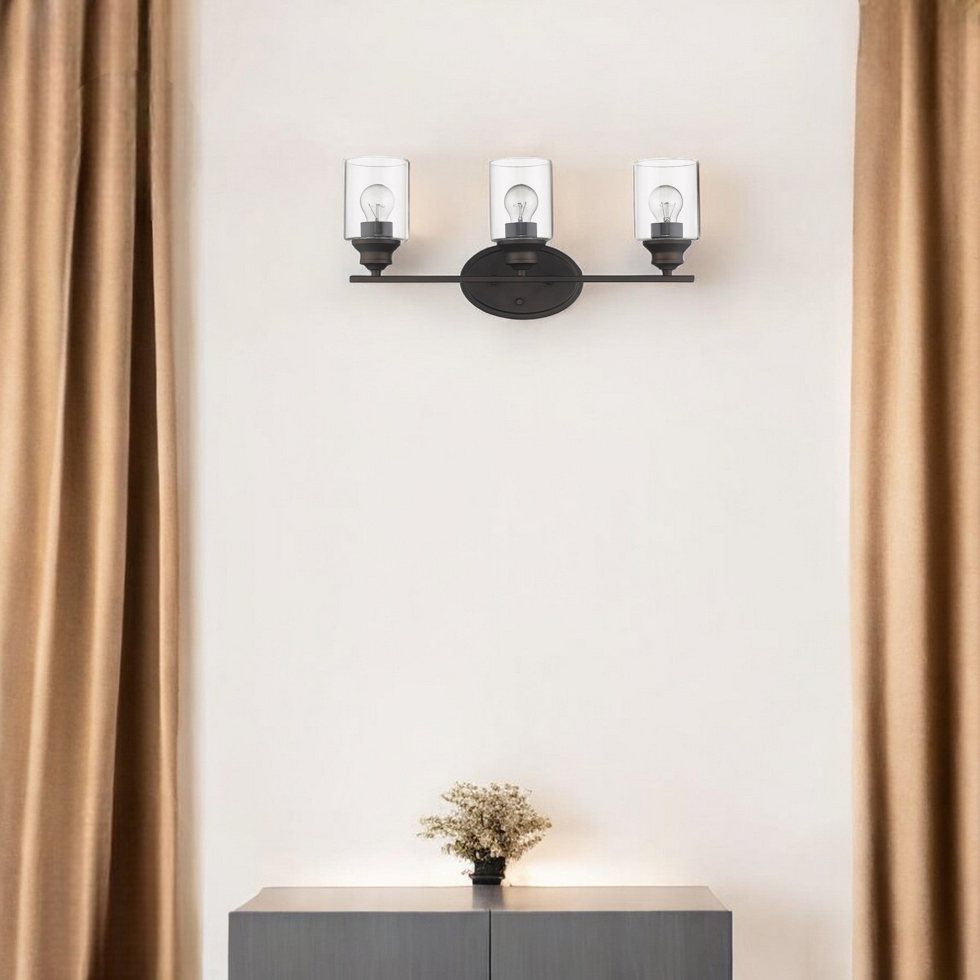 Three Light Bronze Wall Light with Clear Glass Shade