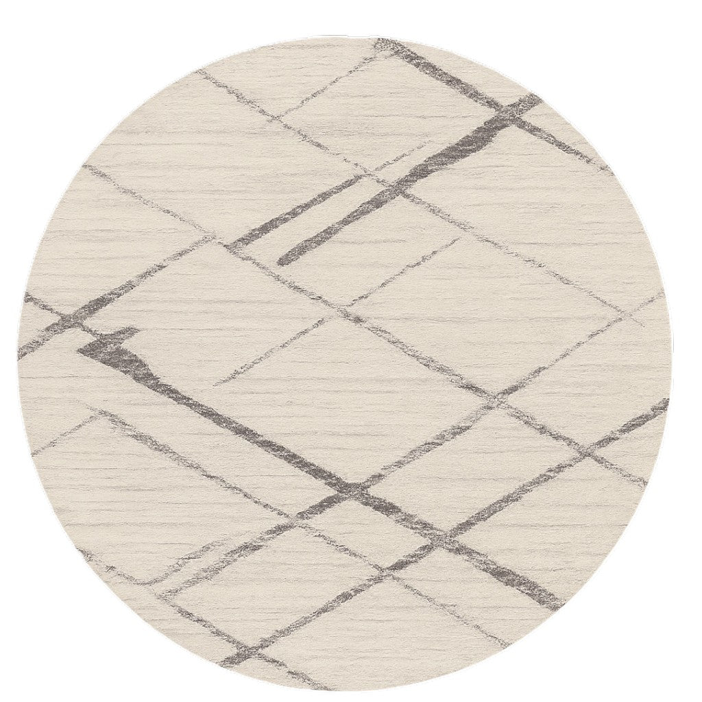 8' Beige and Gray Abstract Distressed Round Rug