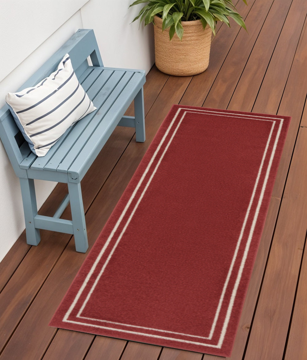 6' Brick Red And Ivory Indoor Outdoor Runner Rug