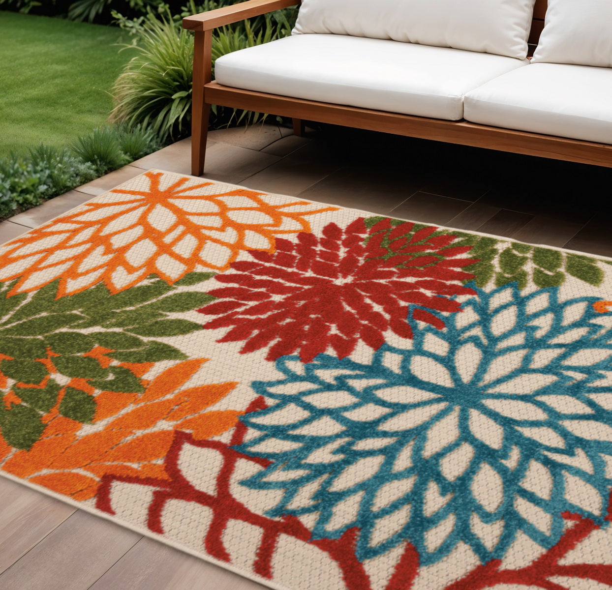 7' X 10' Ivory Green Blue Orange And Red Floral Indoor Outdoor Area Rug