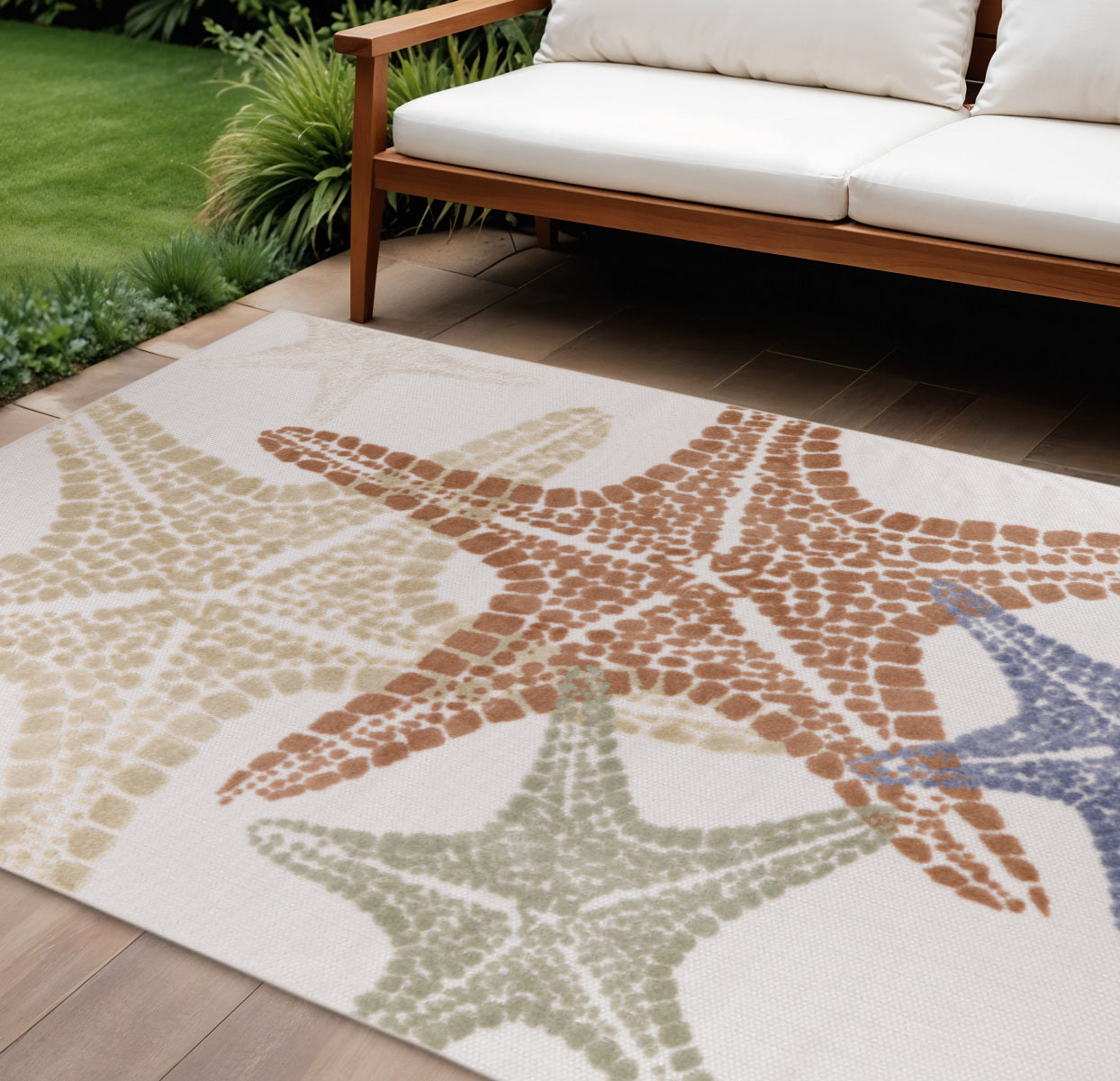 9' X 12' Ivory Blue Yellow Orange And Green Starfish Indoor Outdoor Area Rug