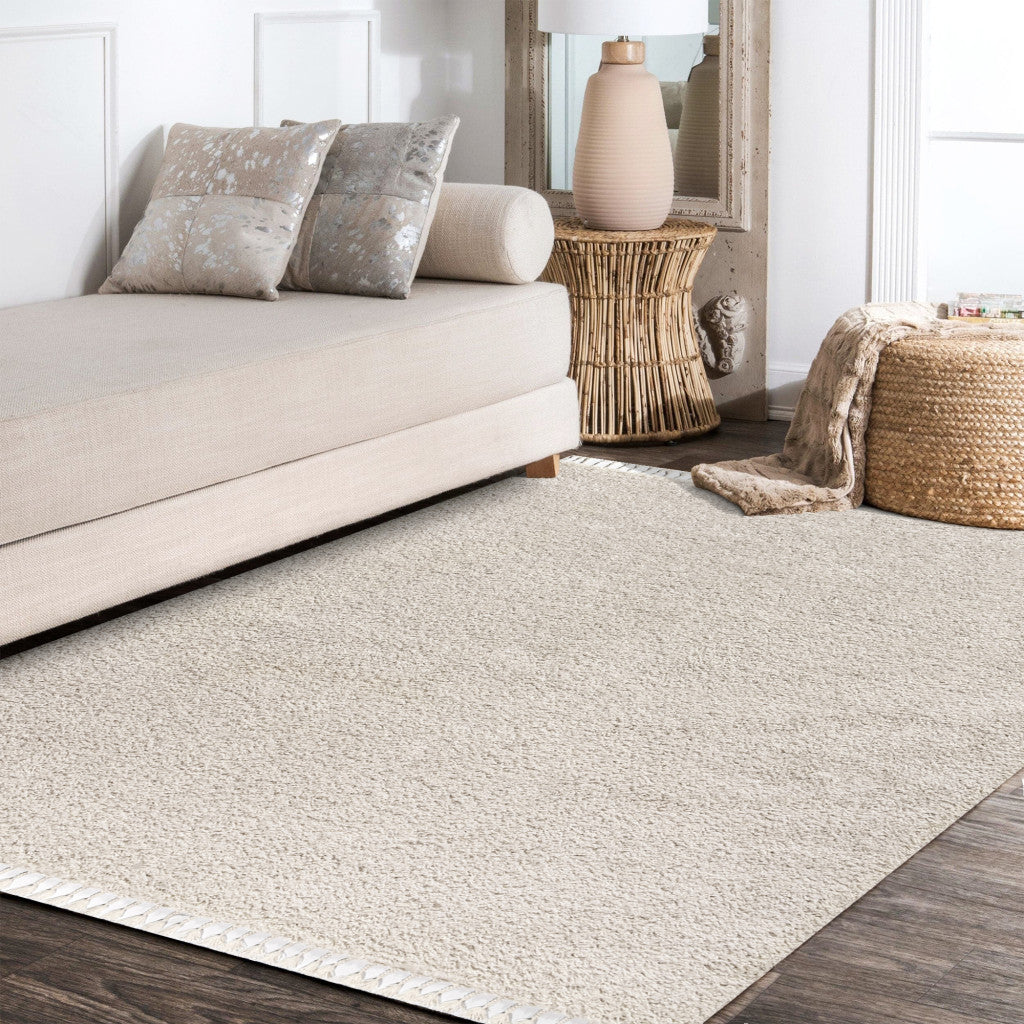 8' X 10' Cream Area Rug With Fringe