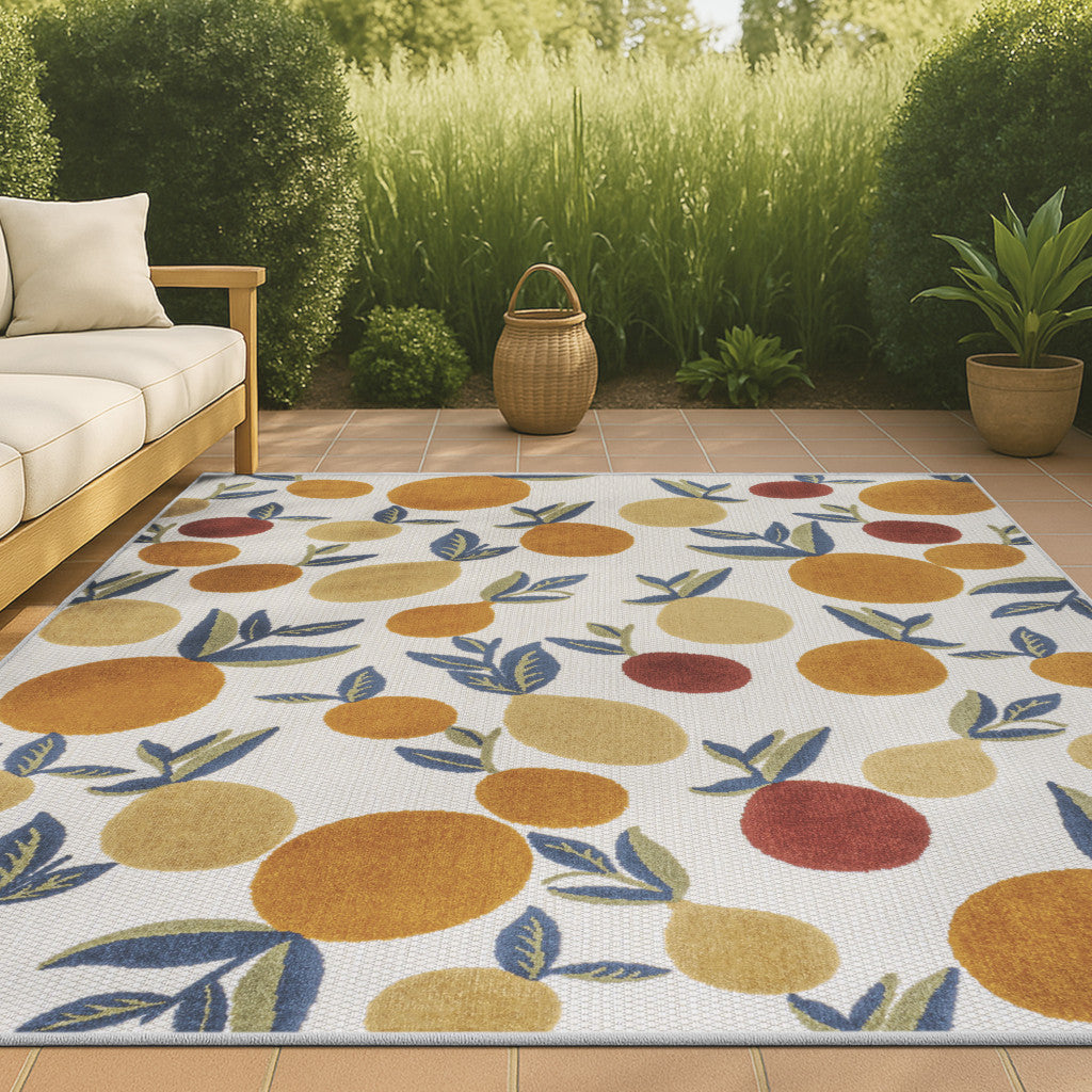 5' X 8' Orange Beige And Cream Polka Dot Indoor Outdoor Area Rug